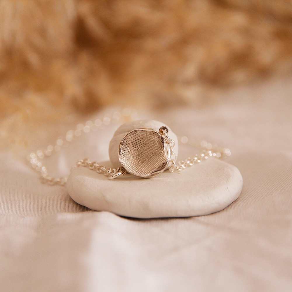 Kit Huellas: Pulsera en plata de ley con cadena de plata